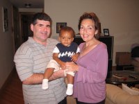 Kim Saretsky Endlich with husband David and their child